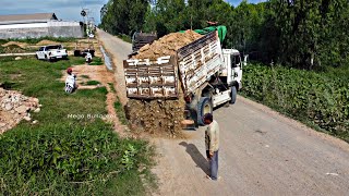 Start a new project Filling Land by Dump truck unloading soil With Mini Bulldozer [upl. by Sumer370]