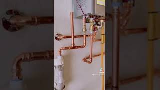 Installing a new tankless water heater Rinnai [upl. by Andromede]