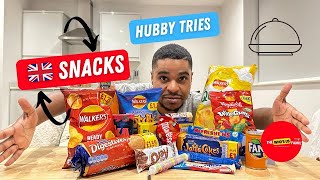 MY AMERICAN HUSBAND TRIES BRITISH SNACKS FOR THE FIRST TIME [upl. by Hannej]