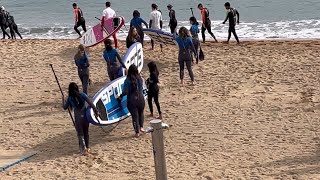 Barceloneta beachChildren enjoying paddle board riding [upl. by Ardnos]