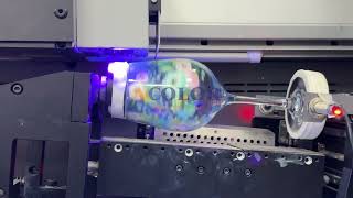 Digital printing on transparent products using a drum UV printerbottleprinter cylinderprinter [upl. by Eednam584]