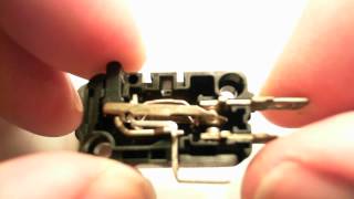 Inside a microswitch showing its operation in HD [upl. by Verine]