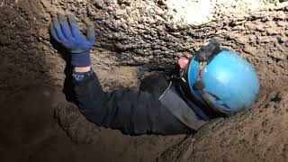 Scott squeezing through Rat Hole at Dead Horse Cave  part 1 [upl. by Sloane]