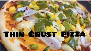 THIN CRUST PIZZA with PIZZA BASE RECIPE  Cafe style Make at home now detailedrecipe usingoven [upl. by Airretnahs]