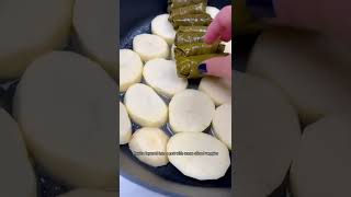 Making delicious warak enab Lebanese stuffed grape leaves shorts [upl. by Burrows]