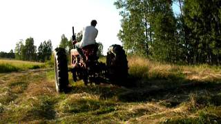 Farmall H sickle mower cutting hay [upl. by Anders641]