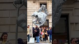 Levitating Silverman Statue waving back at a child behindperformer floating street art [upl. by Dreher863]