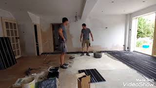 Installation of under floor heating Polypipe Overlay Plus panels and pipes for under floor heating [upl. by Solorac24]