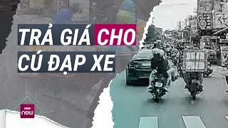 Đạp người chở hàng ngã sõng soài trên đường Hành vi côn đồ sẽ bị xử lý ra sao  VTC Now [upl. by Ataynek]