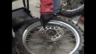 Removing stripped brake rotor disc bolts from a motocross dirt bike motorcycle wheel [upl. by Dorreg]