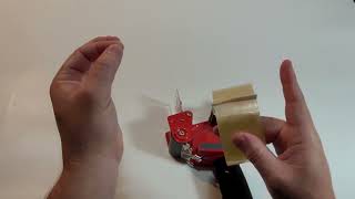 How to add a roll of tape to a tape dispenser [upl. by Lyj]