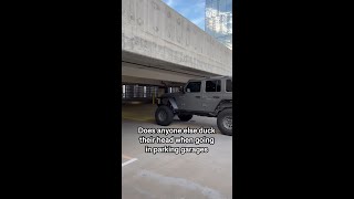 Does anyone duck their head going through a parking garage [upl. by Mossolb910]