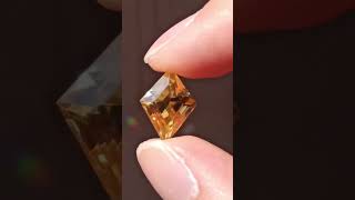 A brilliant and rare scheelite gemstone cut in a rhombus shape gem scheelite crystals [upl. by Grishilde256]