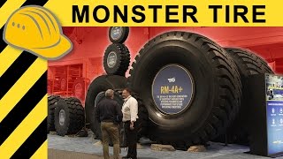 BIGGEST TIRE IN THE WORLD  50000 EXTREME MINING Tire Explained at MINExpo 4K [upl. by Aivirt583]