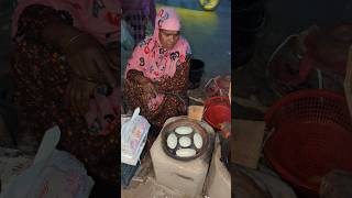 The traditional winter chitai pitha is being sold on the roadside streetfood food foodiebangali [upl. by Collbaith]