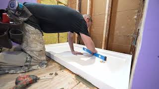 How to Install a Shower Pan Base  PLAN LEARN BUILD [upl. by Elynad]