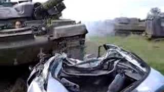 Tank crushes car 17  tank coming off view 2 [upl. by Correna]