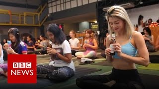 Beer Yoga Have you got the bottle to try it BBC News [upl. by Conn87]