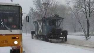 HĂłmuki  Snowsweeper tram in Budapest  StraĂźenbahn [upl. by Yenruoj]