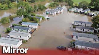 Flood warnings issued for rain across UK as holiday park evacuated [upl. by Adnahc]