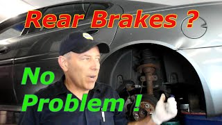 How To Replace Rear Disc Brakes And Rotors On A Pontiac Grand Prix [upl. by Dhaf]