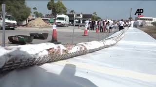 Cyprus thrashes record for biggest kebab in the world all for charity [upl. by Nnairret]