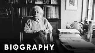 Albert Einstein  Nobel Prize Winner amp Physicist  Mini Bio  Biography [upl. by Enneillij]