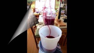 Bottling my first batch of wine with my home built corker [upl. by Ajat]