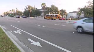 Caught on video Car speeds past stopped school bus in Fort Myers [upl. by Llerot]