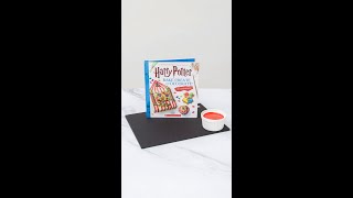 We made delicious Hogwarts Crest Cookies using our new Harry Potter Bake Create and Decorate book [upl. by Oates563]