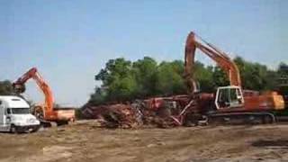 Scrap Operation on Farm Machinery Salvage Yard [upl. by Woothen753]