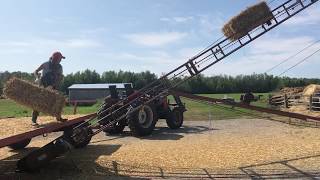 Loading the barn up with straw by using an elevator [upl. by Enywad]