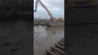 Large excavators are bogged down in the mud [upl. by Geilich]