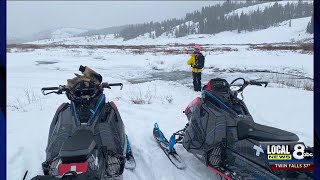 2 snowmobilers rescued after breaking through ice [upl. by Catima]