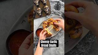 Cheesy Garlic Bread Skulls for Halloween made in Haunted Skull Cakelet Pan Recipe on our website [upl. by Uziel59]