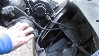 How to replace your headlight Kia Sedona DIY [upl. by Abehs]