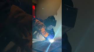 Learning to stick weld Electrode 6013 running flat beads and overlaps on a miller shop class [upl. by Errecart]