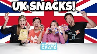 AMERICANS TRY BRITISH SNACKS Snack Crate UK Edition Challenge [upl. by Nevanod]