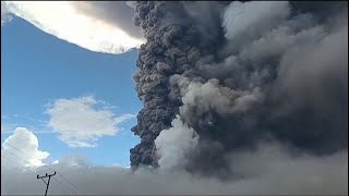 Smoke and ash billows from Indonesia volcano [upl. by Shimberg775]