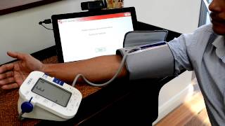 Telehealth tutorial How to use your Omron blood pressure monitor [upl. by Carli]