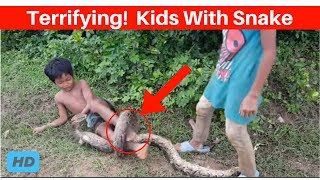 AMAZING Kids Catching Snakes and Playing with it using Bare Hands in the Wild [upl. by Adner]