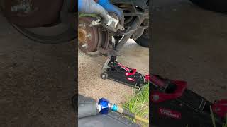 2018 Jeep Wrangler fourdoor rear brake job and Walmart hyper tough floor jack [upl. by Aremahs]