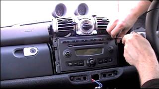 How to remove a smart fortwo 450 451 and Roadster stereo [upl. by Ayidan147]