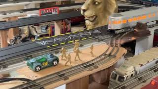 Carrrera Slot cars Goes over 027 Lionel TrackDon’t try this [upl. by Anailuy67]