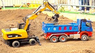 RC CONSTRUCTION MODELS amp RC TRUCKS IN MOTION CAT MOBILE EXCAVATOR [upl. by Yllatan]