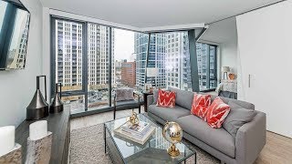 A 1bedroom model at The Paragon a new amenityrich South Loop tower [upl. by Aihsenad]