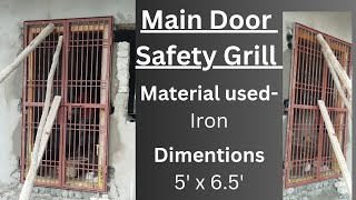 Placing of safety grill for main door material used iron [upl. by Azaleah446]