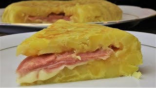 Tortilla de patata rellena con jamón cocido y queso [upl. by Enywad]