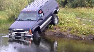 Chevrolet Suburban 2500 across the river Mud 4x4 Russia [upl. by Marena]