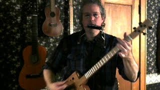 Cigar box guitar demo  playing The River by Bruce Springsteen [upl. by Nibaj]